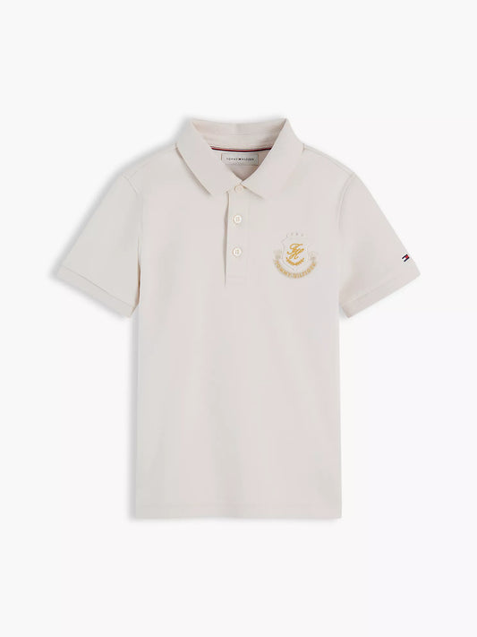 Polo infantil con logo de escudo