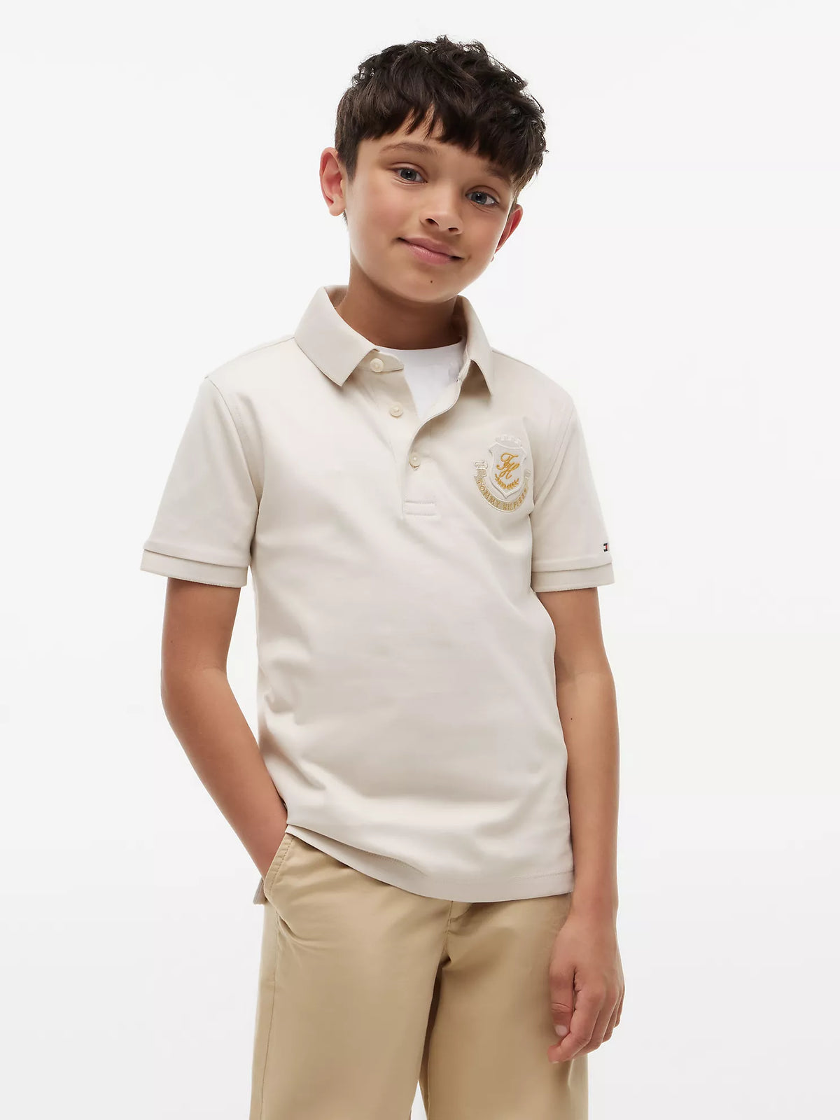 Polo infantil con logo de escudo