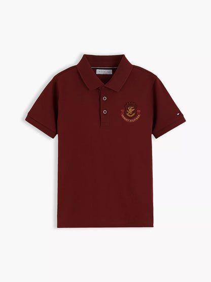 Polo infantil con logo de escudo