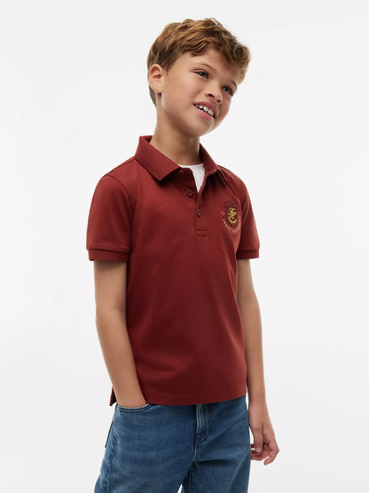 Polo infantil con logo de escudo