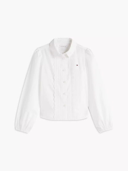 Camisa infantil con ojales bordados
