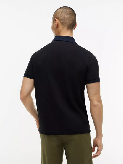 Polo de corte regular con rayas bordadas